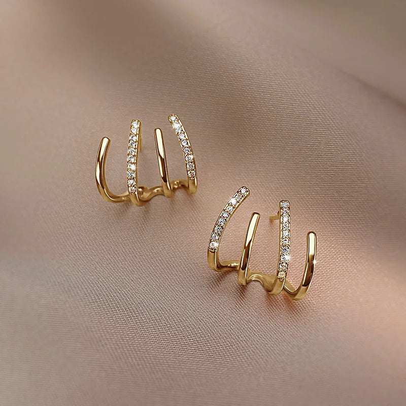 Vridne Øreringe | Elegant Design | Guld eller Sølv